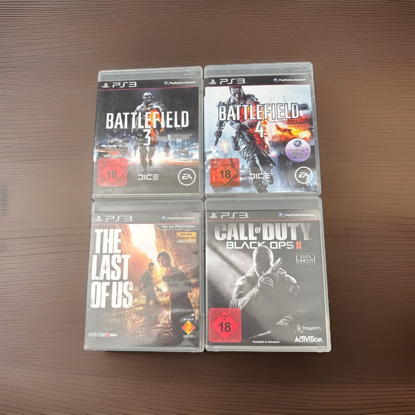 PS3 Spiele Bundle: The Last of Us, Call of Duty Black Ops 2, Battlefield 3 & 4⁠
