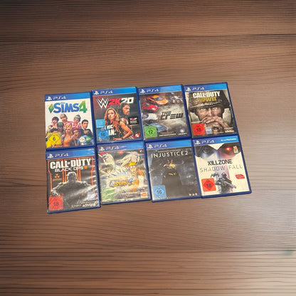 PS4 Spielepaket 8 Spiele: Call of Duty, Naruto Storm 4, Injustice 2, Sims 4 uvm.